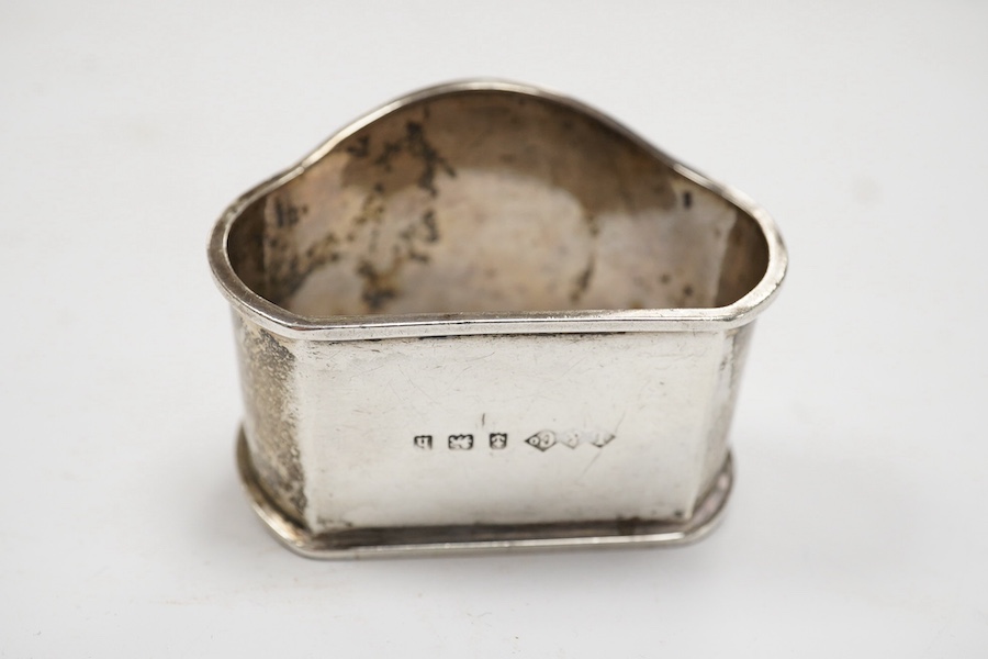 An Edwardian silver and enamelled napkin ring, by Liberty & Co, Birmingham, 1907, 52mm. Condition - poor to fair